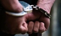 联邦快递诈骗头目的助手在帮派内部争吵后被捕