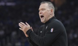 尼古拉·约基奇在压哨时命中40英尺，掘金以130：127击败勇士